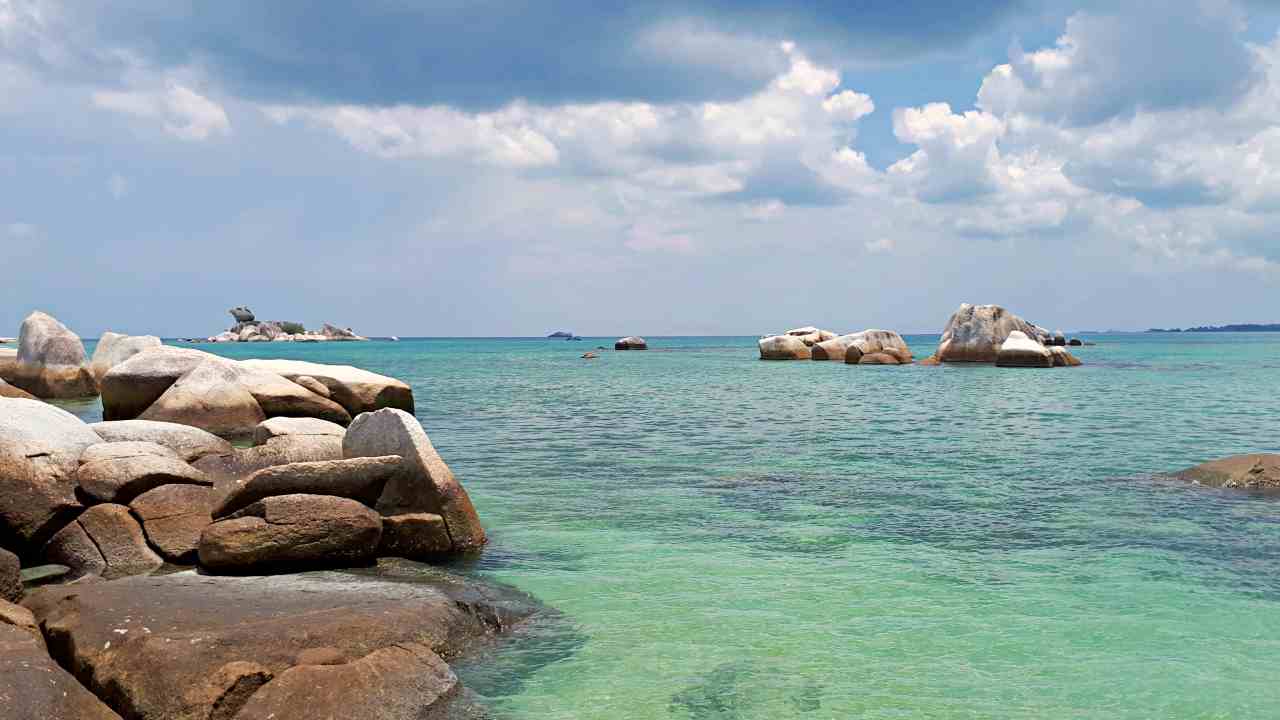 granite rocks tanjung kelayang beach 
