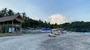 sunbeds and warung at virgin beach, candidasa