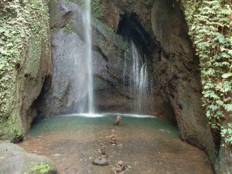 Waterfall disharge crystal clear water on summer.